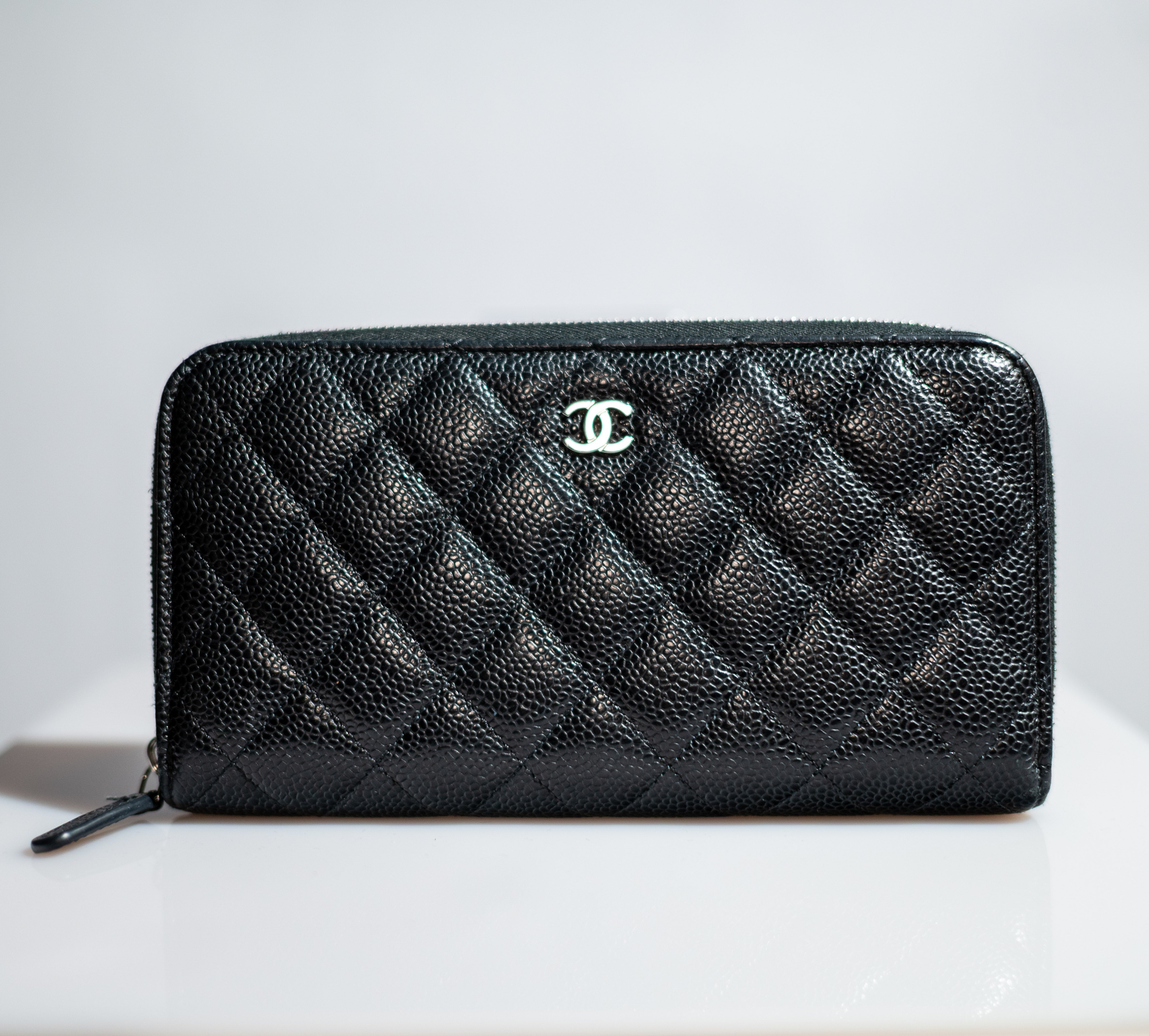 Chanel Zip Around Wallet in Black Quilted Caviar Leather